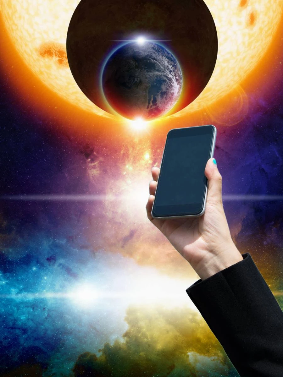 Smartfony kompatybilne ze Starlink Na zdjęciu telefon i planety